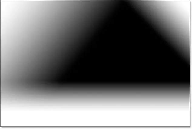 Vẽ một Foreground sang Transparent gradient, lần này ở góc trên bên phải của mặt nạ.  Hình ảnh © 2015 Steve Patterson, Photoshop Essentials.com
